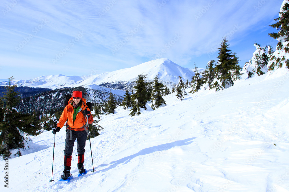 Winter hiking in snowshoes.