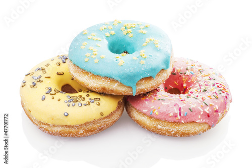 Three glazed donuts isolated on white background