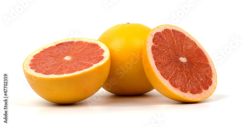 Grapefruit sliced on white background.