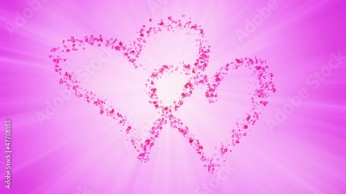 Heart shaped particles are creating two hearts.