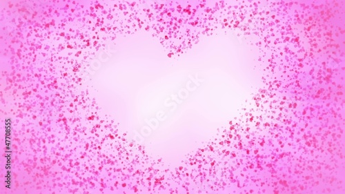 Small heart particles join to form a heart shape.