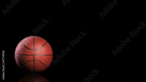 Basketball, jumping on black background, loop