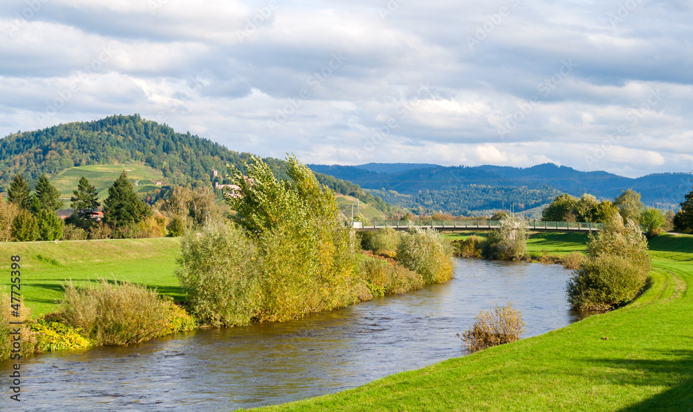 View of Kinzig river in the Black Forest mountains. Germany View of Kinzig river in the Black Forest mountains. Germany