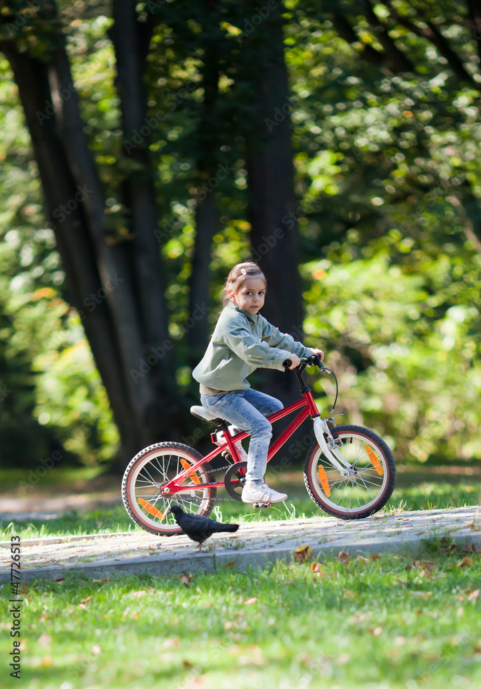Little girl riding bike
