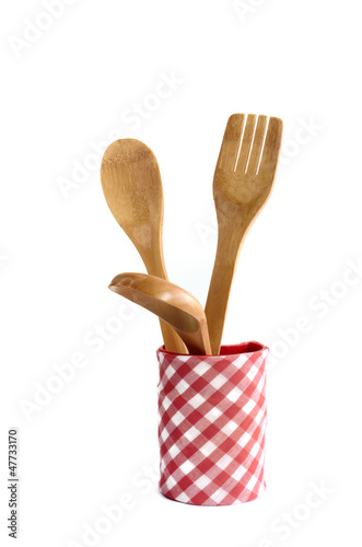 Wooden kitchen utensils isolated on white