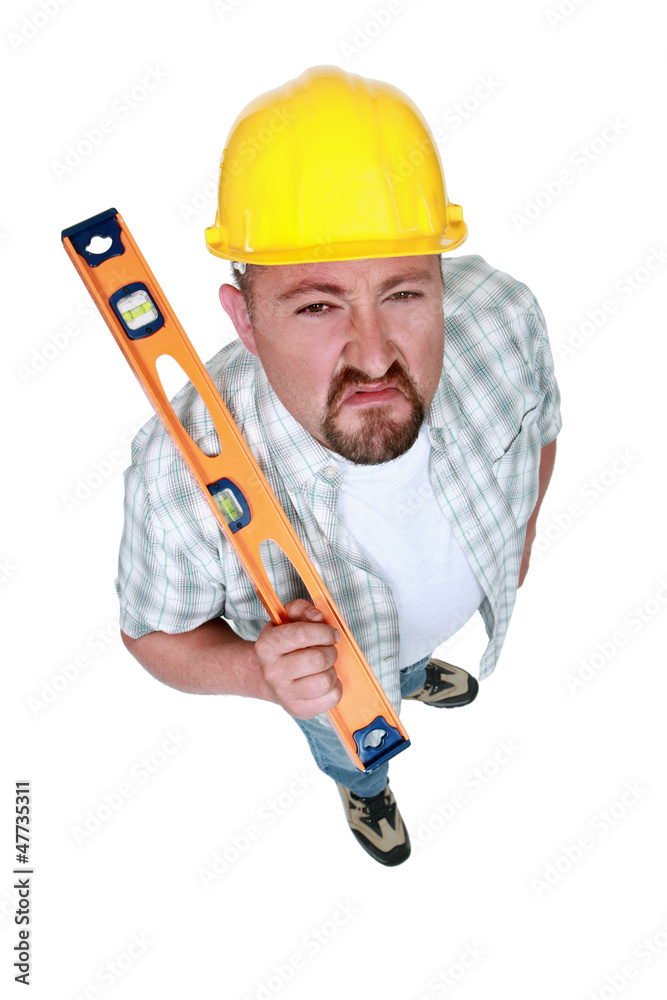 A angry handyman with a level. A angry handyman with a level.