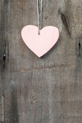 Valentine s Day love heart on rustic style background