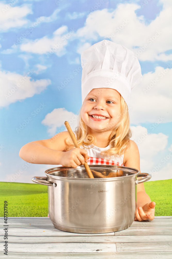 laughing pretty little girl in a checap with a basket bread laughing pretty little girl in a checap with a basket bread