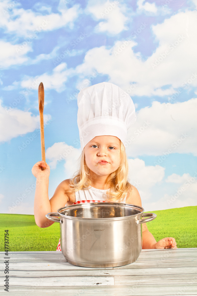 laughing pretty little girl in a checap with a basket bread laughing pretty little girl in a checap with a basket bread