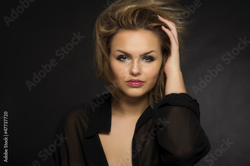 Beautiful woman with a windblown hairstyle