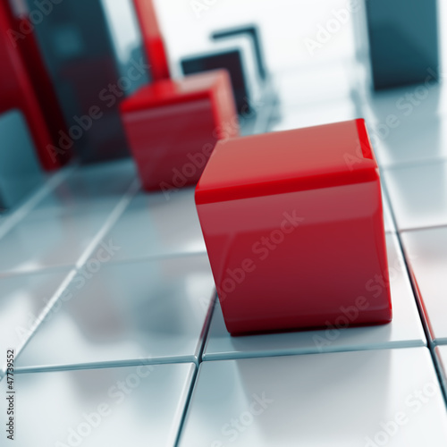 Abstract metallic cubes and one is in focus