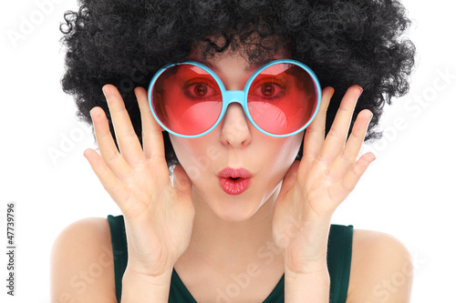 Woman with black afro and sunglasses