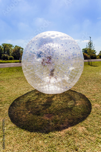 child has fun in the Zorbing Ball photo