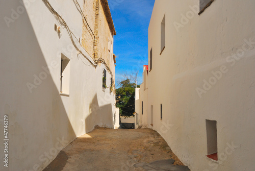 Cobblestone street in Vejer, a Spanish white town.