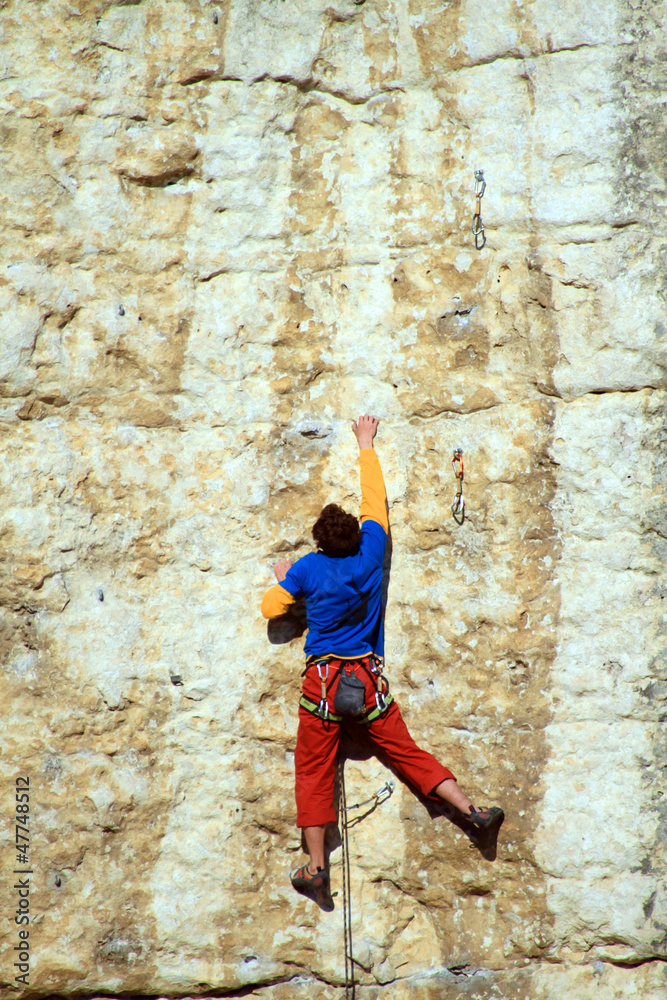 Climber on the route. Climber on the route.