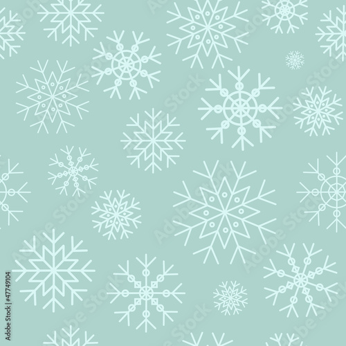 White snowflakes on a blue background