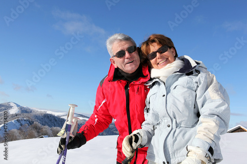 Senior couple in the snow
