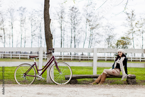 Girl with bicycle
