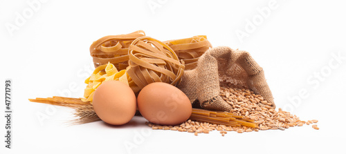 pasta assortment and ingredients isolated on white background