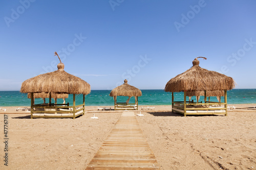 Beach lounge on the beach © aragami