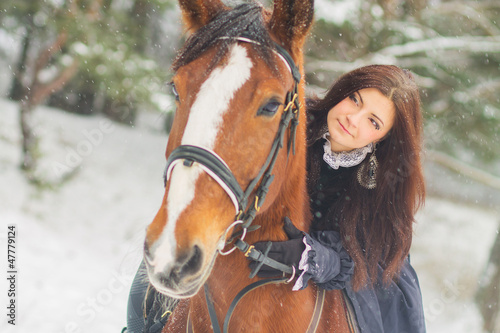 Beautiful woman and horse in winter © asayenka