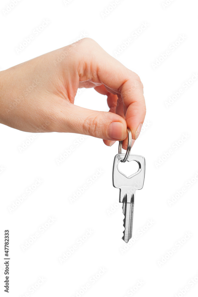 hand holding key isolated on white hand holding key isolated on white