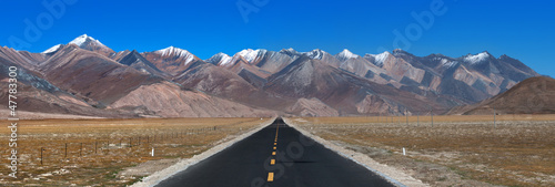 Long way ahead with high mountain in front