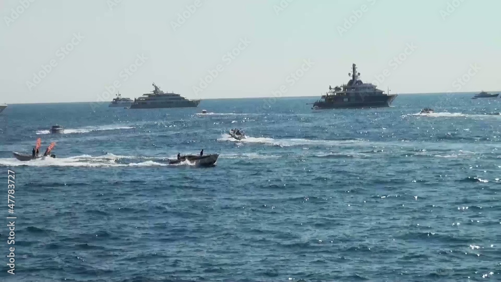 Boats and yachts floating on the surface of the sea