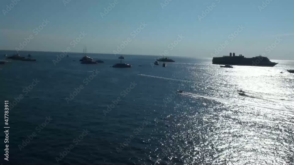Circular view of sea filled with yachts and boats on a sunny day Circular view of sea filled with yachts and boats on a sunny day