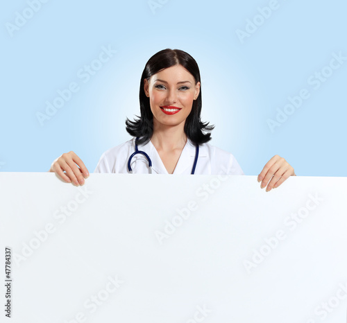 Young female doctor with a banner