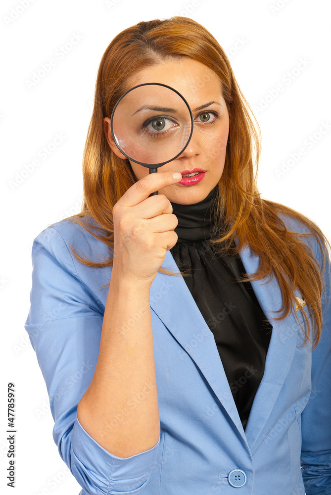 Business woman holding magnifier Business woman holding magnifier