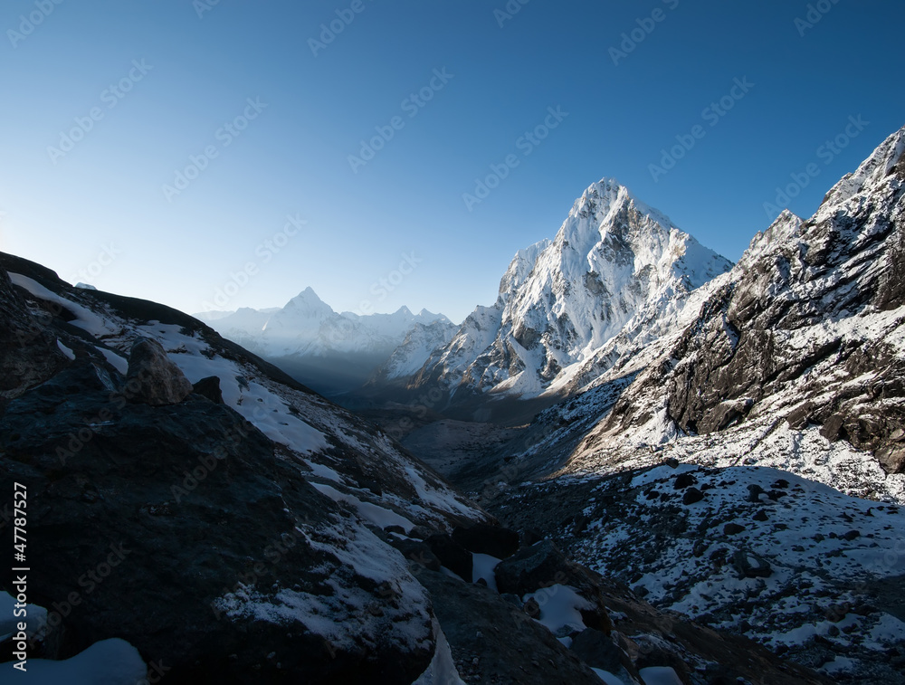 Cho La pass and snowed peaks at dawn in Himalayas