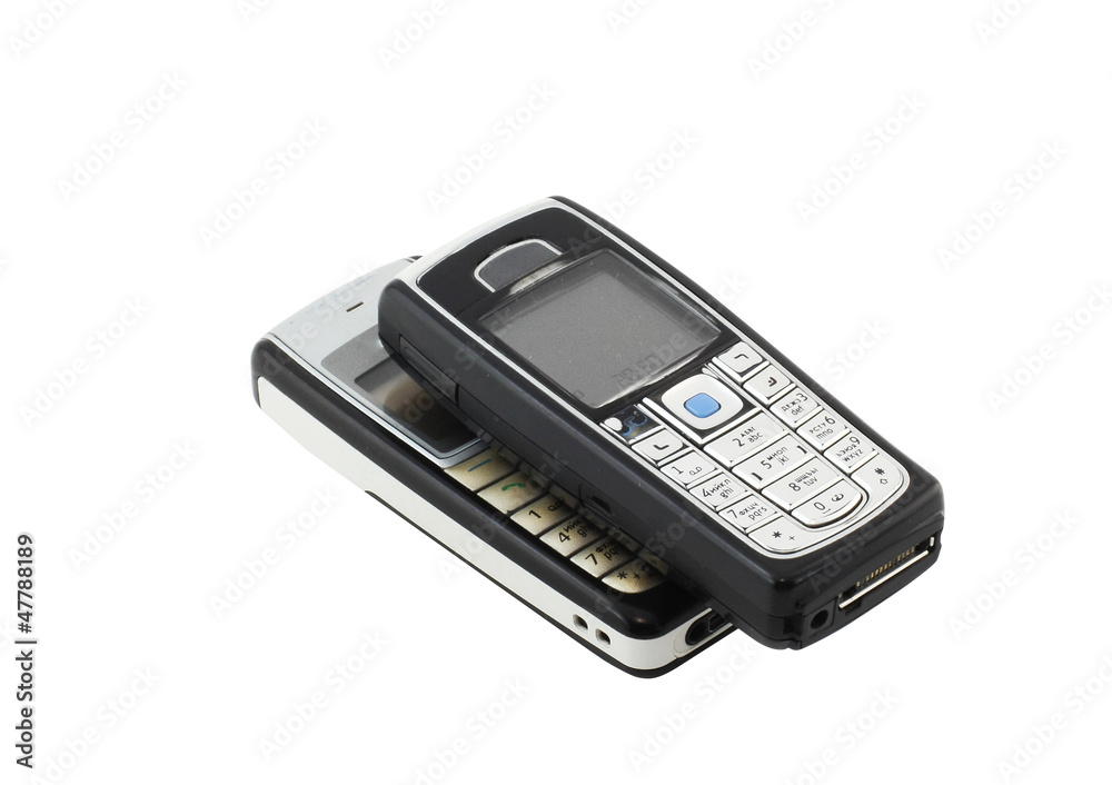 Antiques, old cellular(mobile) phones. Isolated Antiques, old cellular(mobile) phones. Isolated