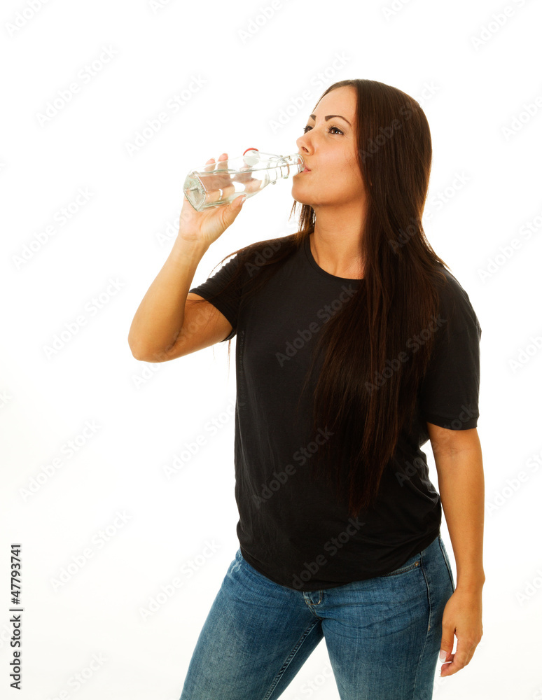 Woman drinking fresh water from bottle Woman drinking fresh water from bottle