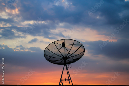 Telecommunication Satellite dish background sky sunset