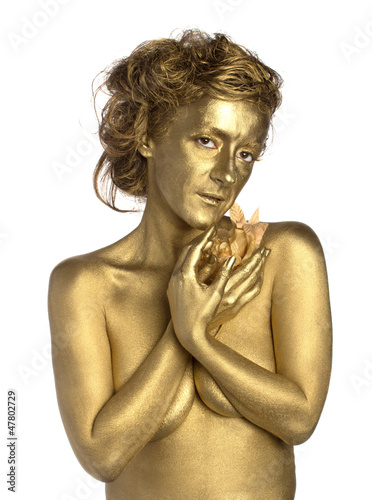 Golden woman with flower