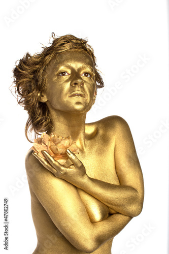 Golden woman with flower