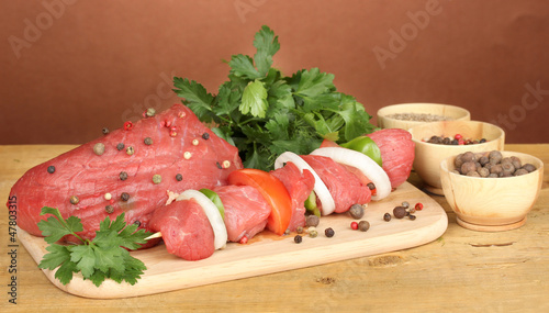 Raw beef meat marinated with herbs and spices