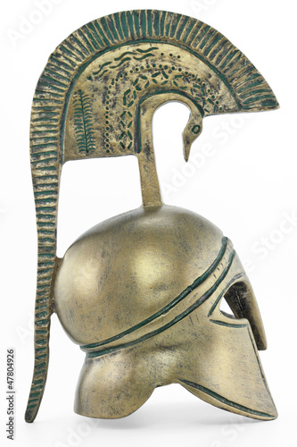 Ancient greek helmet replica on white background