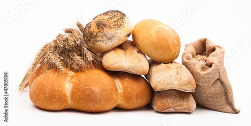 assortment of baked bread isolated on white background