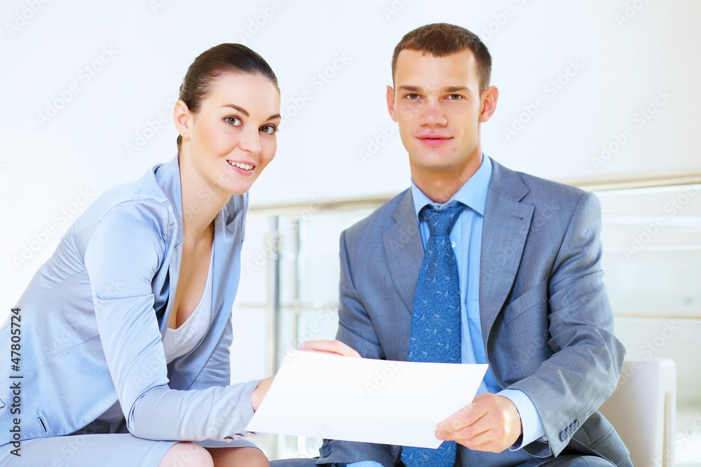 a portrait of a businesswoman and businessman a portrait of a businesswoman and businessman