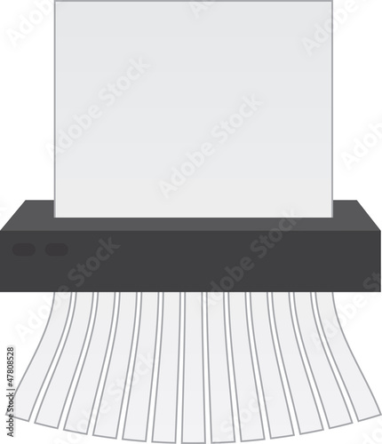 Paper shredder cutting up a piece of paper