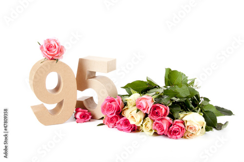 Age in figures on a bed of roses