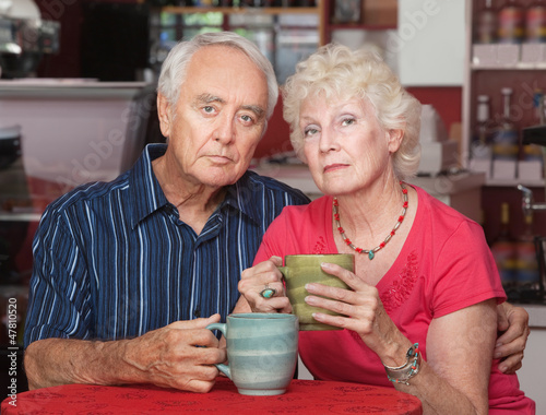 Serious Senior Couple with Coffee