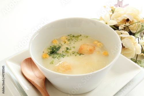 Corn potage with toast and herb on top