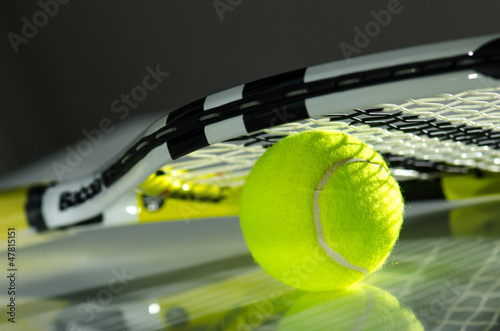 Tennis ball and racket