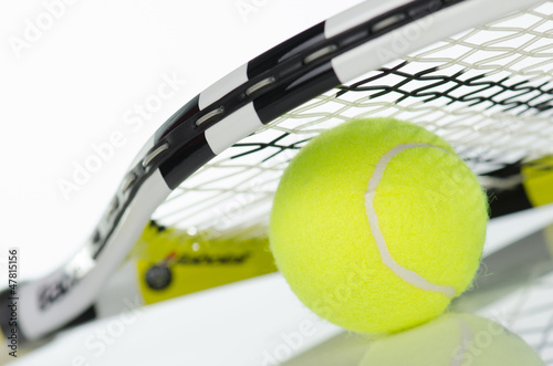 Tennis ball and racket