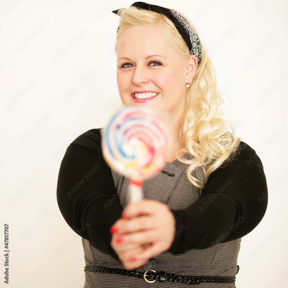 Fototapeta premium blonde Frau mit Lollipop