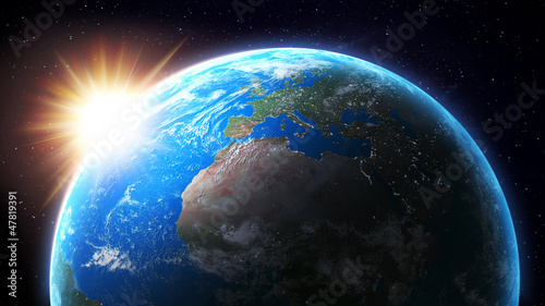 Fototapeta Naklejka Na Ścianę i Meble -  Sun setting over Earth