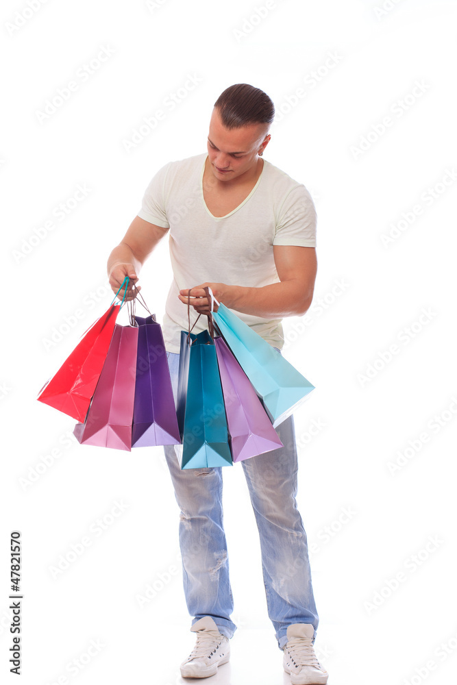 Young fashionable guy with shopping bags Young fashionable guy with shopping bags